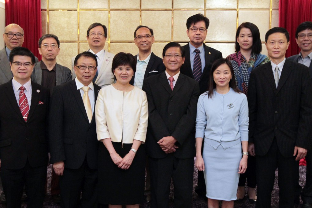 (Front row, from left) Federation of International SMEs president Gary Lo; founding president of the Hong Kong Greater China SME Alliance Association Jimmy Wan; DHL Express Hong Kong vice-president commercial Ecila Chan; Hong Kong Trade Development Council deputy executive director Raymond Yip; SCMP chief operating officer Elsie Cheung; Hong Kong (SME) Economic and Trade Promotional Association vice-president Francis Lee; (back row, from left) HKGCC SME committee chairman William Wong; Hong Kong Small and Medium Enterprises General Association vice-chairman Albert Lau; Hong Kong SME Development Federation president Edward Lam; SME Global Alliance president Jefferson Wat; Hong Kong SME Economic and Trade Promotional Association committee member Peter Leung; Hong Kong Small and Medium Enterprises General Association general manager Pion Lam; and Hong Kong Promotion Association for SMEs committee member Li Yat-chuen, at the SCMP Enterprising Awards luncheon in Wan Chai. Photo: Bruce Yan