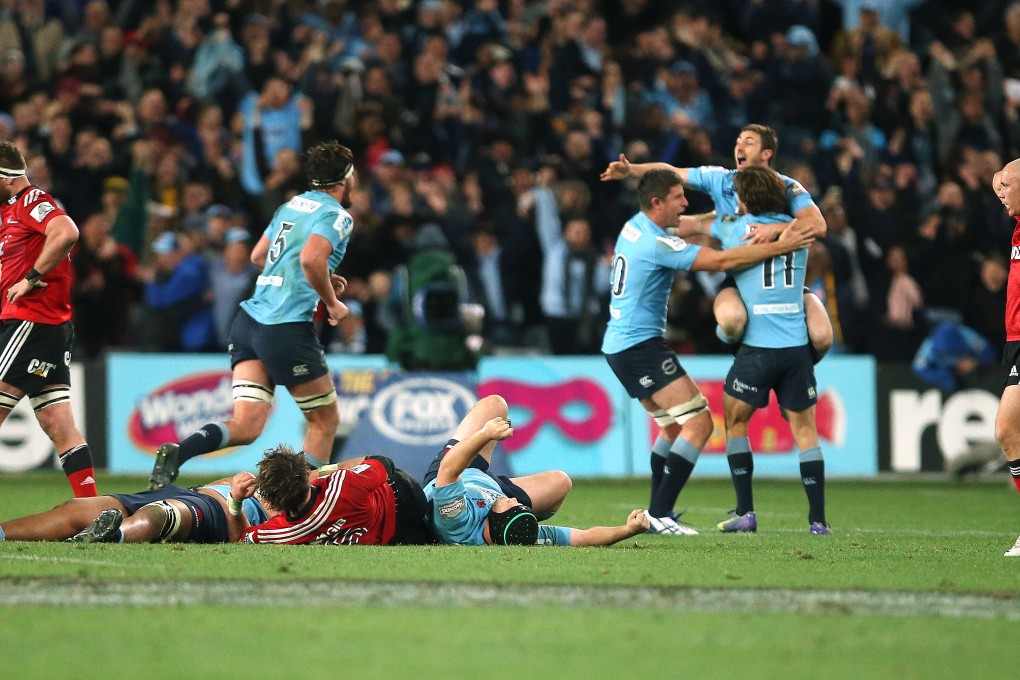 The Waratahs celebrate their 33-32 win over the Crusaders in the Super Rugby final in Sydney last year. Photo: AP