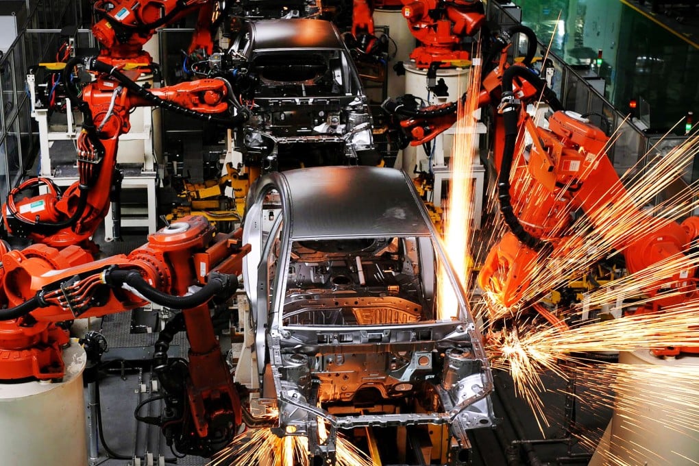 Machines assemble cars in a Geely Auto factory in Zhejiang province. China aims to boost manufacturing productivity by 2025. Photo: Xinhua