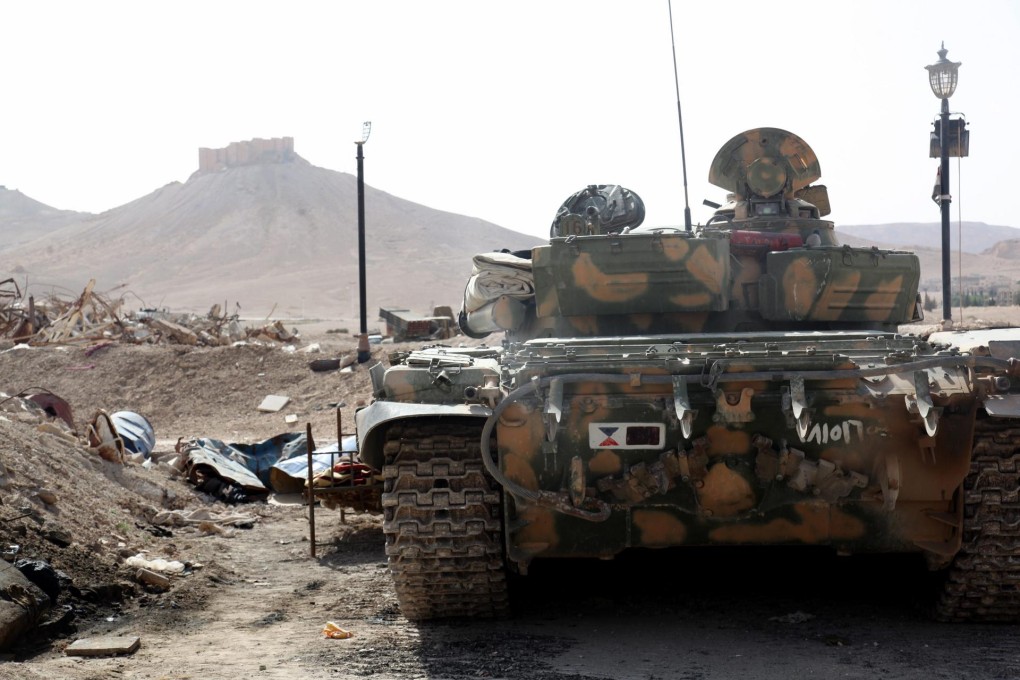 A Syrian tank on watch in the town of Palmyra.Photo: EPA