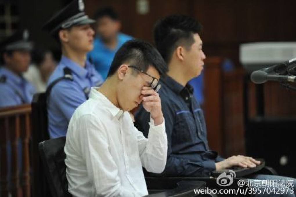 Beijing road racers Yu Muchun (left) and Lamborghini driver Tang Wentian during their trial on Thursday. Photo: SCMP Pictures