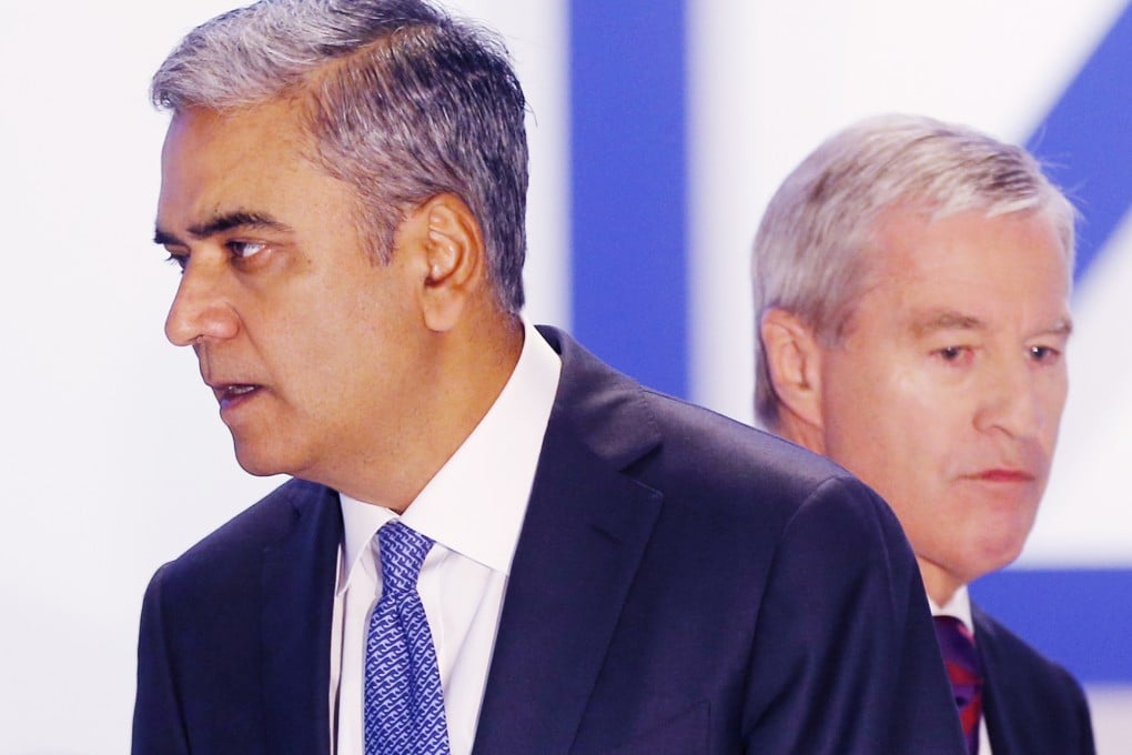 Co-CEOs of Deutsche Bank, Anshu Jain (left) and Juergen Fitschen arrive for the annual shareholders meeting on May 21. Photo: AP