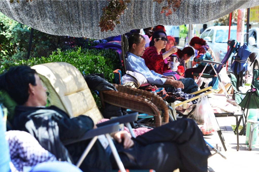 Parents began queuing five days early to enrol their children at a Beijing kindergarten. Photo: SCMP Pictures