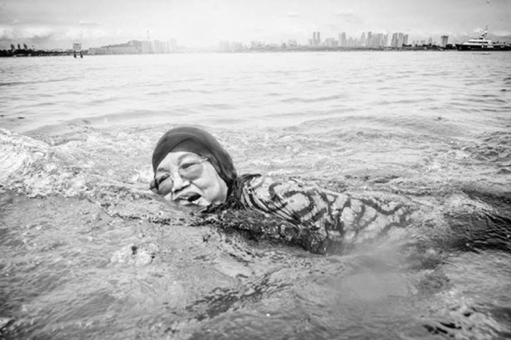 Bedah Bte Din, 76, swims off St John’s Island, Singapore. More than 70 former residents of St John’s and Lazarus islands recently returned for a day trip. Photos: Edwin Koo/Captured; Teo Yen Teck; Dr Ivan Polunin