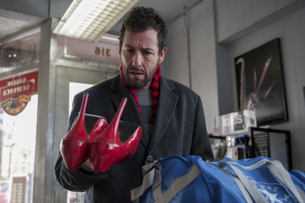 Adam Sandler in a scene from The Cobbler (Category IIA), which also stars Steve Buscemi and Dustin Hoffman and is directed by Thomas McCarthy.