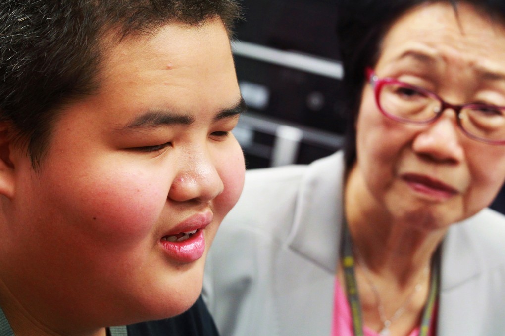 Siu Yau-wai, 12, is being assisted by FTU legislator Chan Yuen-han. Photo: May Tse