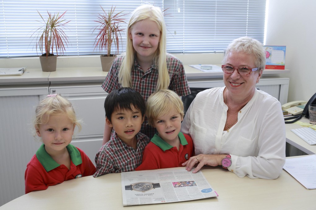 ICHK Hong Lok Yuen principal Ruth Woodward with fundraising students.