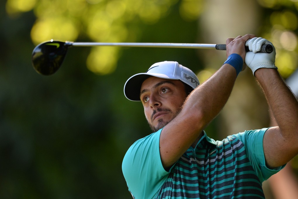 Italy's Francesco Molinari watches his drive from the 18th tee. Photo: AFP