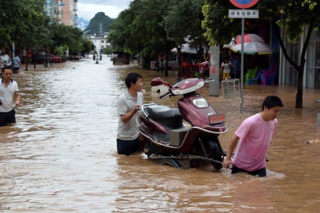 China's flood death toll continues to rise, including two schoolchildren