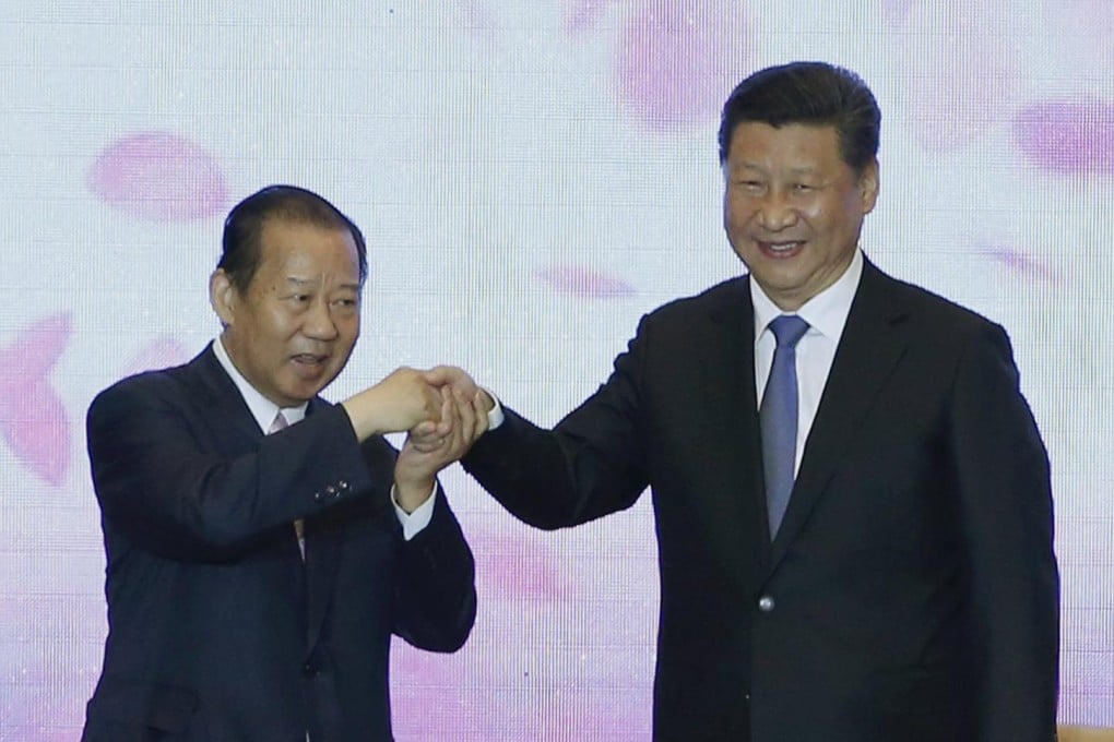 Japanese lawmaker Toshihiro Nikai and President Xi Jinping in the Great Hall of the People in Beijing yesterday. Photo: Reuters