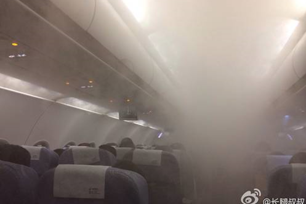 Humidity turns a passenger plane in Shenzhen into a sauna. Photo: SCMP Pictures