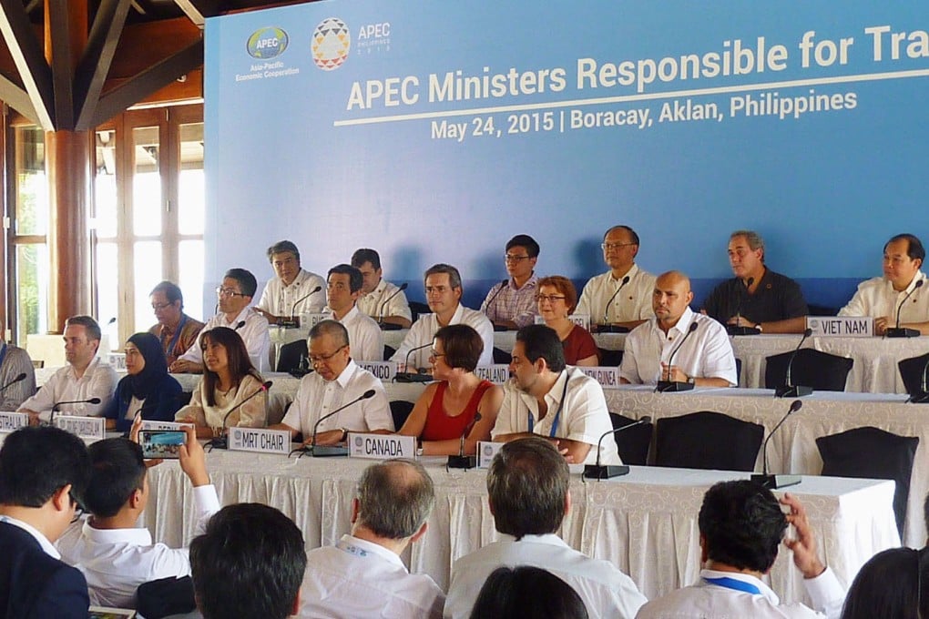 Asia-Pacific Economic Cooperation (APEC) trade ministers at their press briefing on Sunday where they vowed support for efforts to bolster global trade. Photo: Kyodo