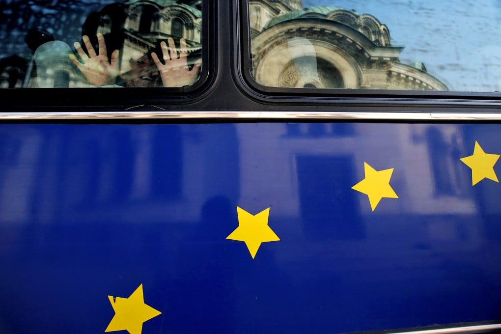 The European Union logo is branded on a bus as officials fret that high patent fees will hit start-ups and hurt companies in the community. Photo: AFP