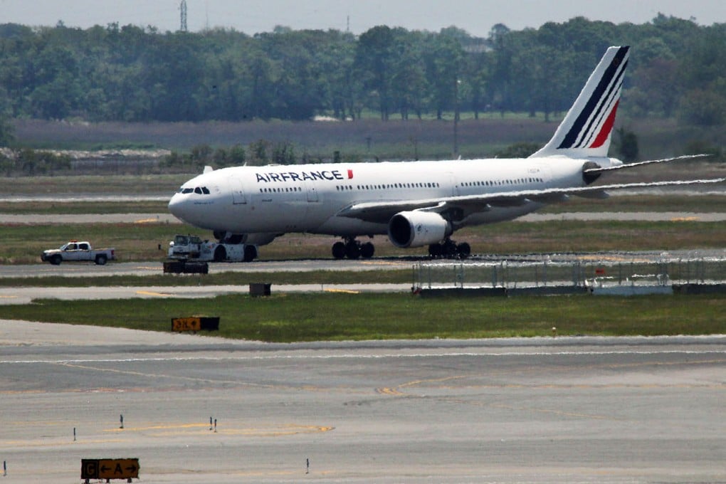 The Air France flight was taken to a secure area at JFK after it was escorted in by fighter jets. Photo: Ellis Kaplan
