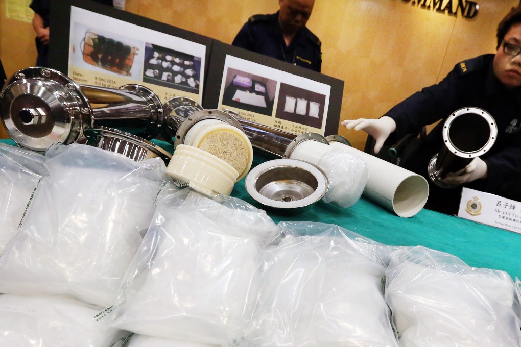 Customs officers display 104kg of meth seized at Hong Kong International Airport in December last year. Photo: Felix Wong