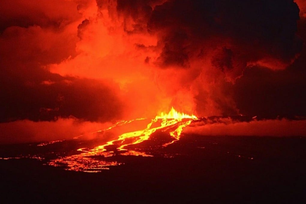 Wolf Volcano on Isabela Island in the Galapagos National Park erupts, creating a deadly threat to the world's only pink iguanas. Photo: EPA