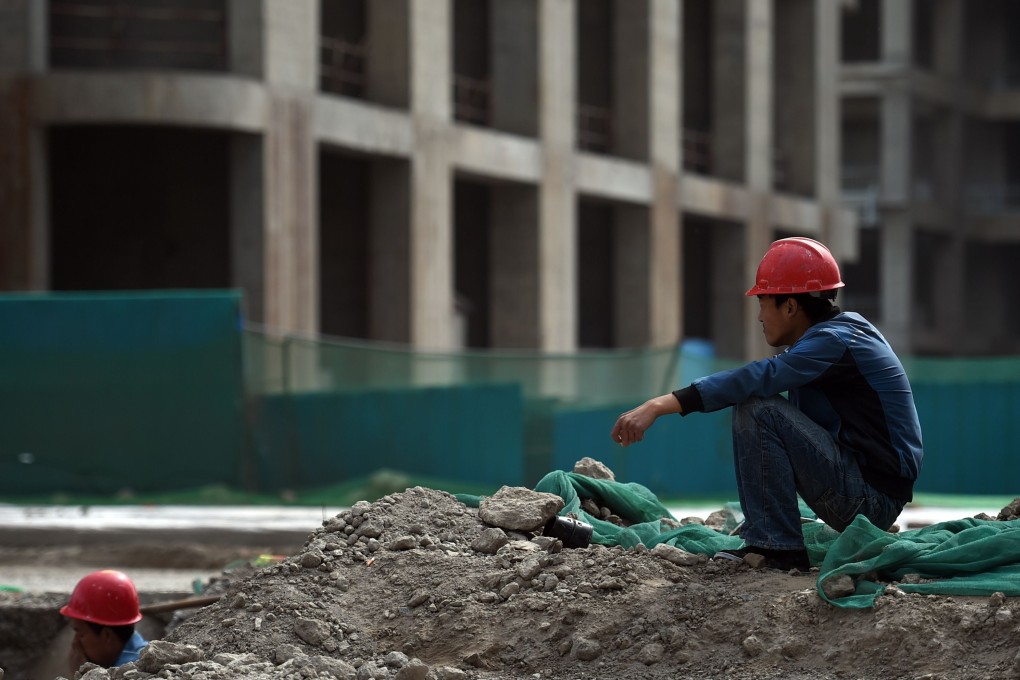 The inflow of funds has been propping up the real estate sector, trust companies and local government financing platforms. Photo: AFP