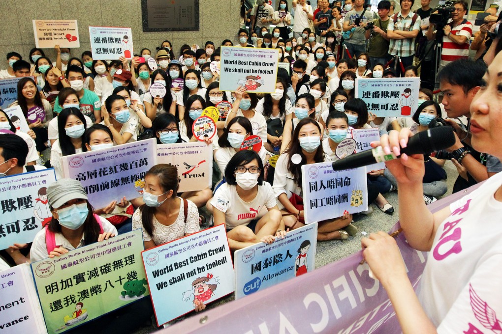 Union chairwoman Dora Lai (right) promises members gathered outside the talks that she will not give up. Photo: Dickson Lee