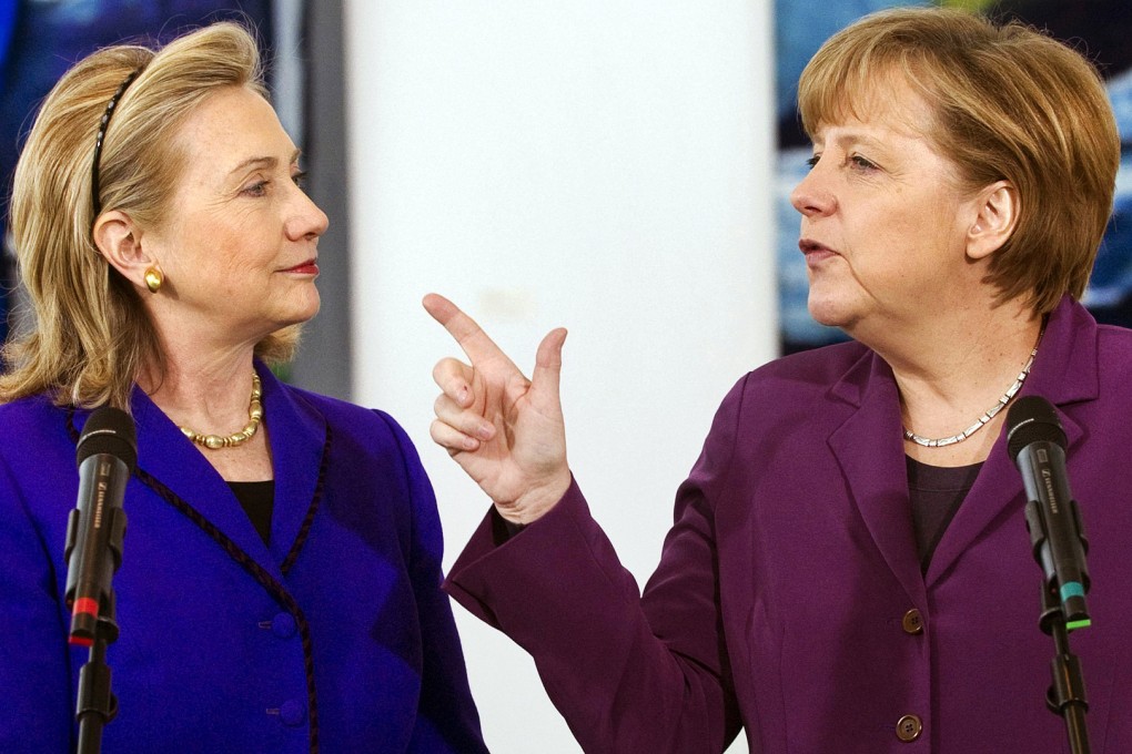 The two most powerful women in the world, first-placed Angela Merkel (right), and Hillary Clinton. Photo: Reuters
