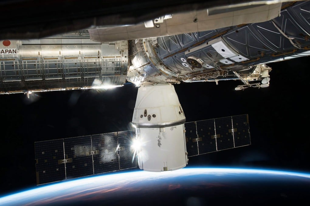 SpaceX's Dragon cargo capsule docked to the Earth-facing port of the Harmony module of the International Space Station (ISS). Photo: EPA/NASA