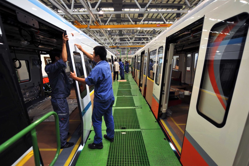 China's plan to boost manufacturing should help the stocks of companies like those who build parts for railway and subway cars. Photo: Xinhua