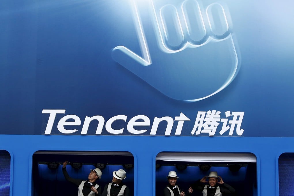File photo of dancers performing underneath logo of Tencent at Global Mobile Internet Conference in Beijing. Photo: Reuters