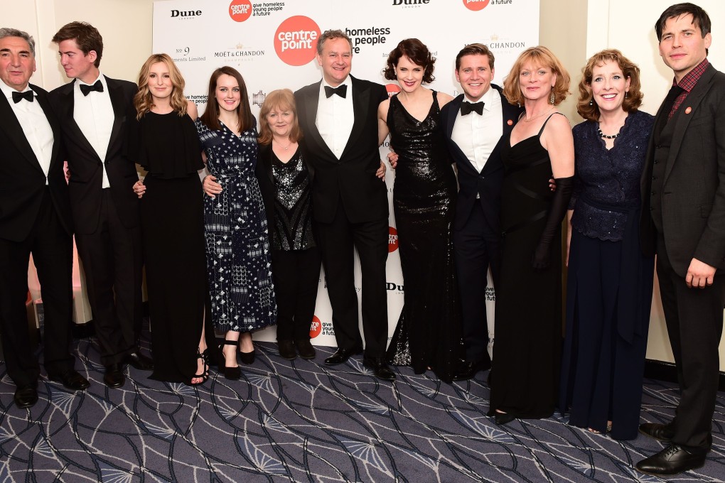 Stars of the British television series Downton Abbey attend a charity ball in London. Wealthy Chinese travellers have asked for a meeting with actors from the show to be arranged.