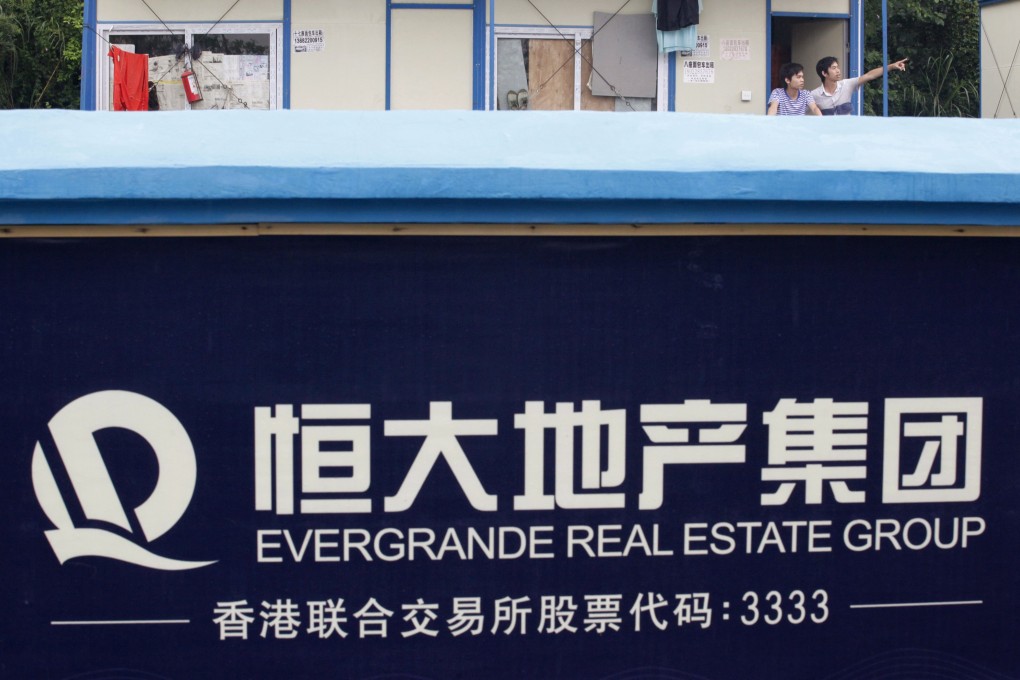 An oversized logo of Evergrande, whose shares were suspended in Hong Kong trading on Thursday. Photo: Reuters
