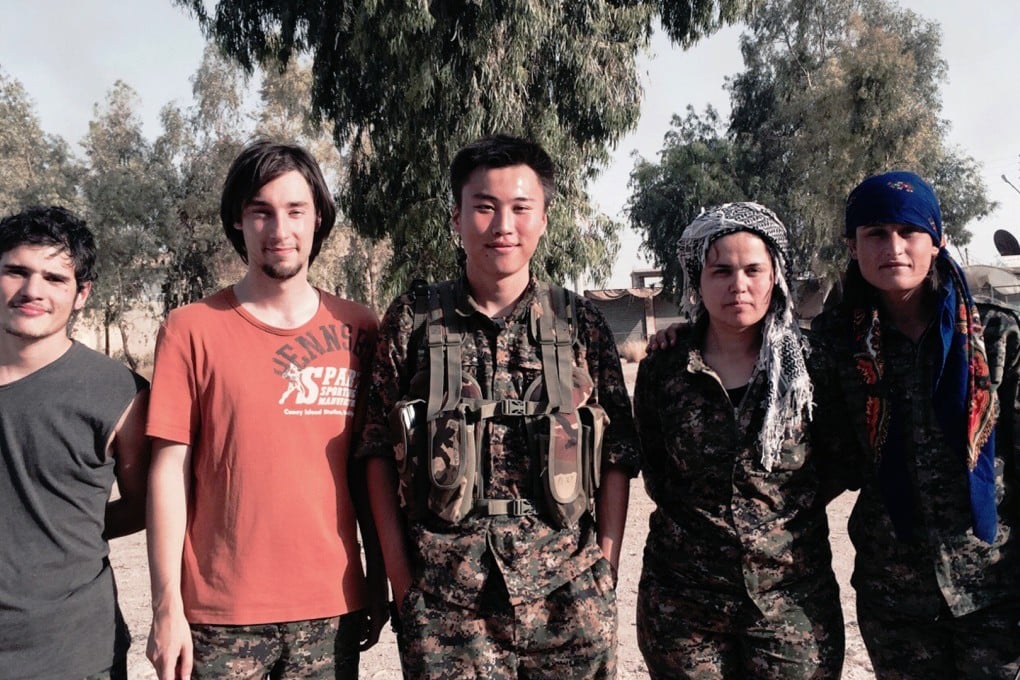 British Chinese volunteer Huang Lei, centre, pictured with fellow volunteers and Kurdish women fighters. Photo: Weibo