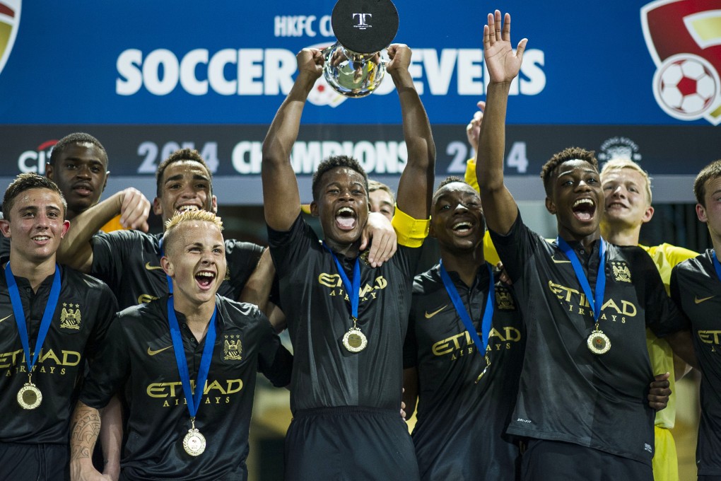 Manchester City celebrate winning the Cup final at the HKFC Citibank Soccer Sevens last year after beating Kitchee 2-1. Photo: SCMP Pictures
