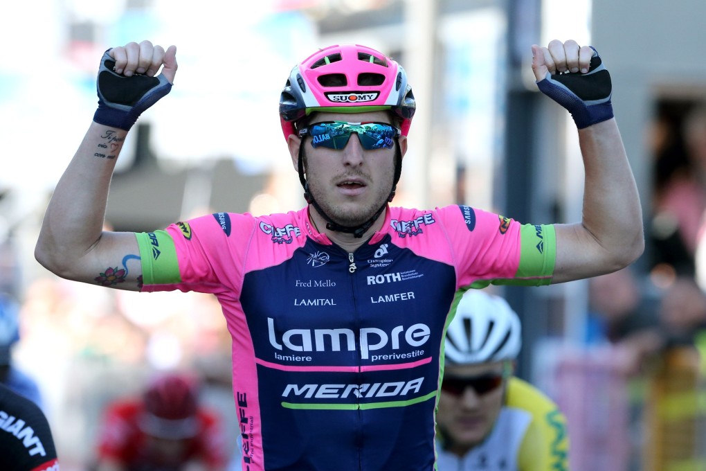 Sacha Modolo celebrates as he crosses the finish line to win the 17th stage of the Giro d'Italia. Photo: AFP