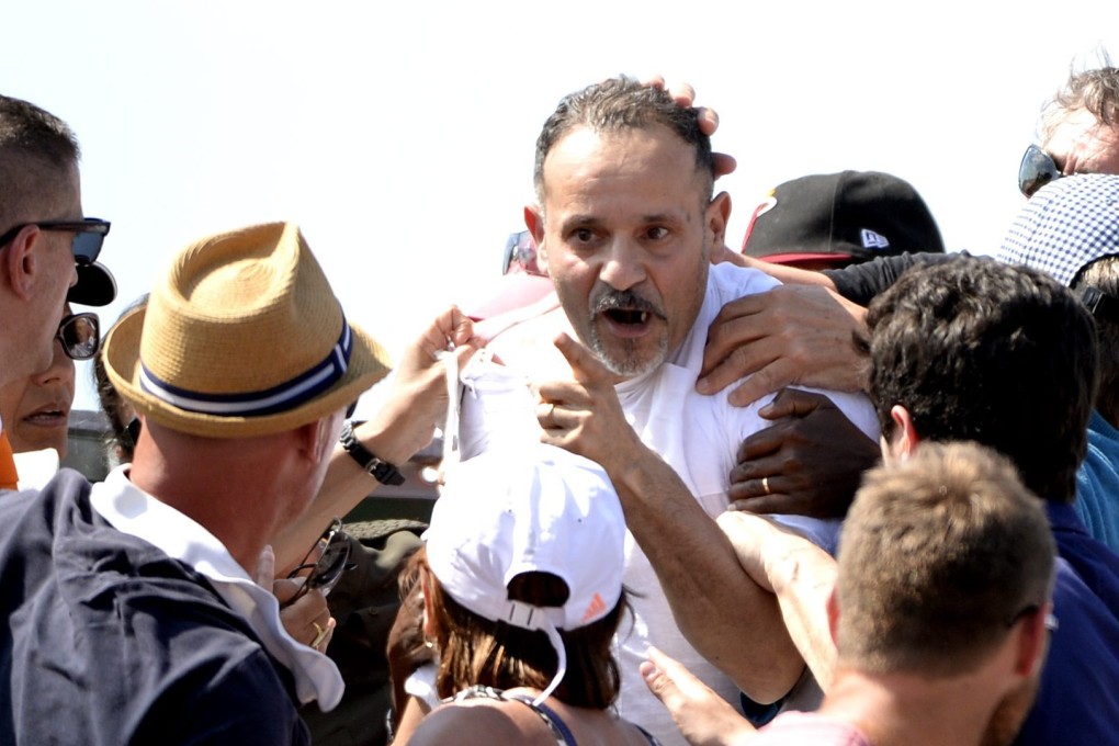 Tempers boil over in the stands during the match between Benoit Paire and Fabio Fognini. Photo: EPA