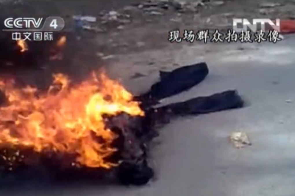 A screen grab from a CCTV programme in 2013 shows a self-immolation case in Gannan, where the latest incident is said to have taken place. File Photo