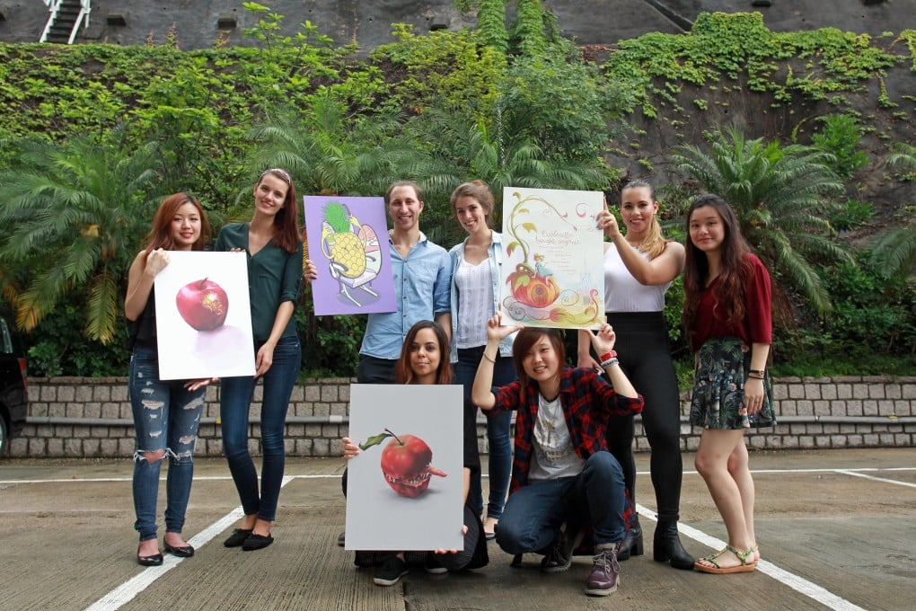 Savannah College students (from left, front) Shann Larsson and Cyma Yuan Shek-man; (back) Viki Chan Yee-wa, Kira Albarus, Daniel Cohen, Melissa Albarus, Beatrice Hug and Cookie Chan Wai-ki, show their posters. Photo: May Tse