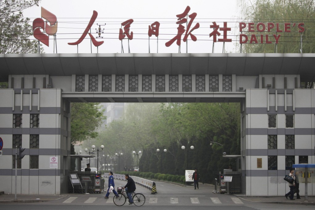 A deputy editor of a People's Daily website is under investigation for allegedly blackmailing companies. Photo: Reuters