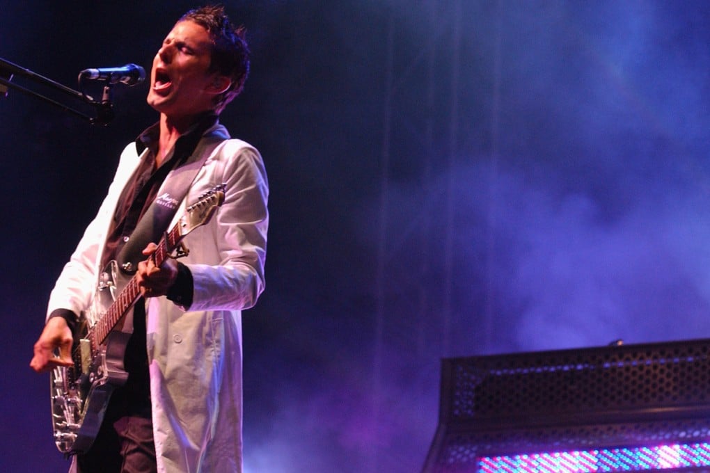 Muse, led by singer/guitarist Matthew Bellamy, seen here performing at Britain's Glastonbury Festival in 2014, have earned a devoted following for their electric style.