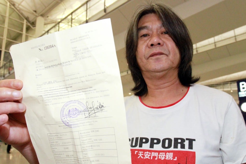 Leung Kwok-hung returns from Malaysia. Photo: May Tse