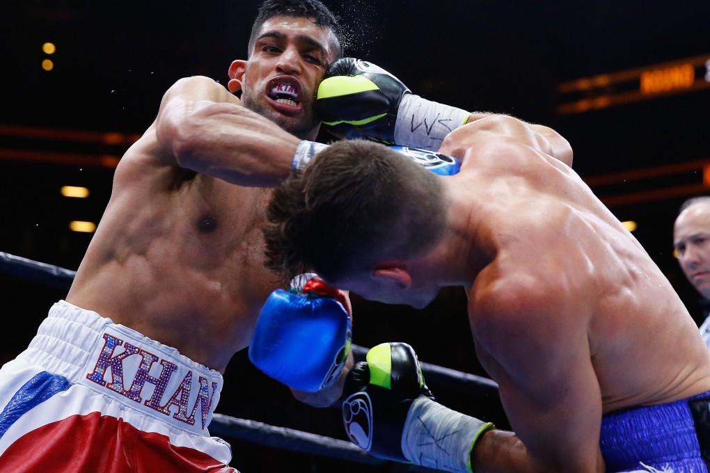 Amir Khan in action against Chris Algieri. Photo: AFP