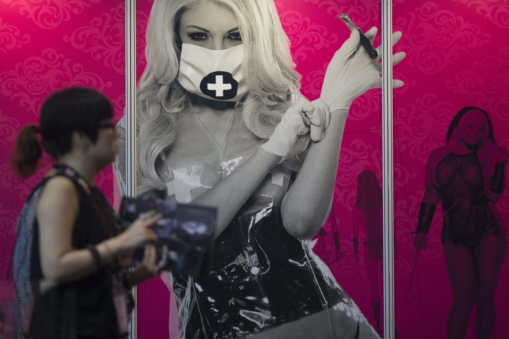 A poster at an adult expo in Asia. Porn stars could soon be forced to don far more protection than just condoms in California. Photo: EPA