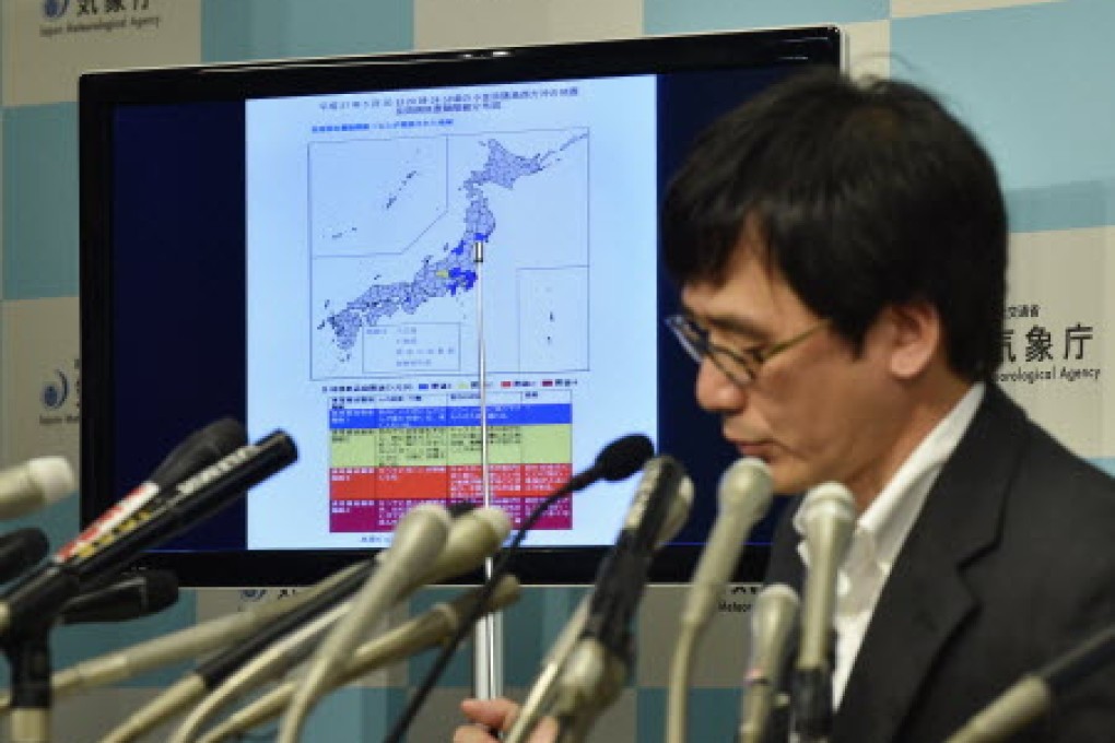 Japan Meteorological Agency earthquake expert Koji Nakamura speaks during a press conference in Tokyo. Photo: AFP