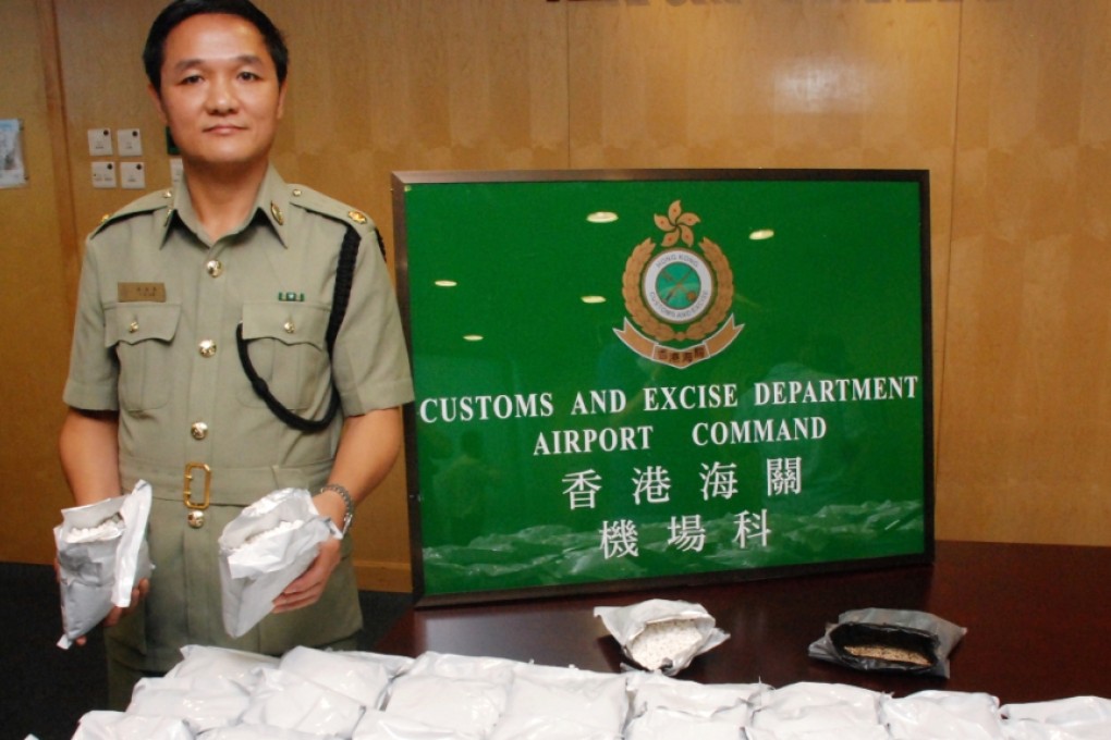 Albert Ho Shi-king, customs assistant commissioner for intelligence and investigation, says 10 visitors tricked into drug trafficking were intercepted at Chek Lap Kok last year.