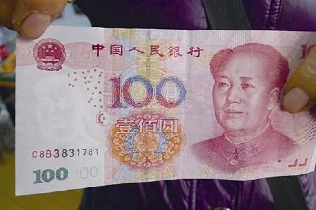 The woman said she occasionally received fake notes from customers in the market and had not meant to give them to the bank. Photo: SCMP Pictures