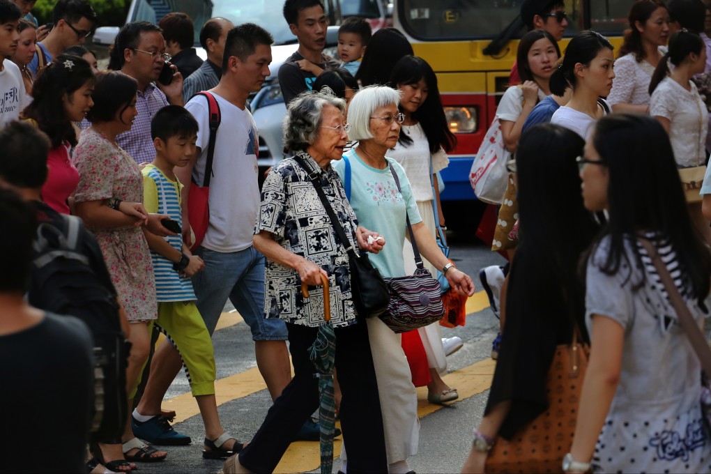 General view of pedestrians crossing the road in Causeway Bay. Photo: Felix Wong