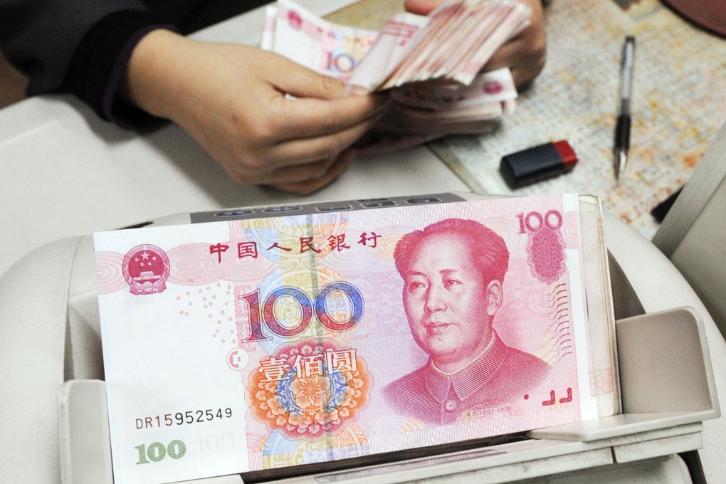 Chinese yuan bank notes are counted in a bank as the currency strengthened on Monday on better-than-expected manufacturing data. Photo: AFP