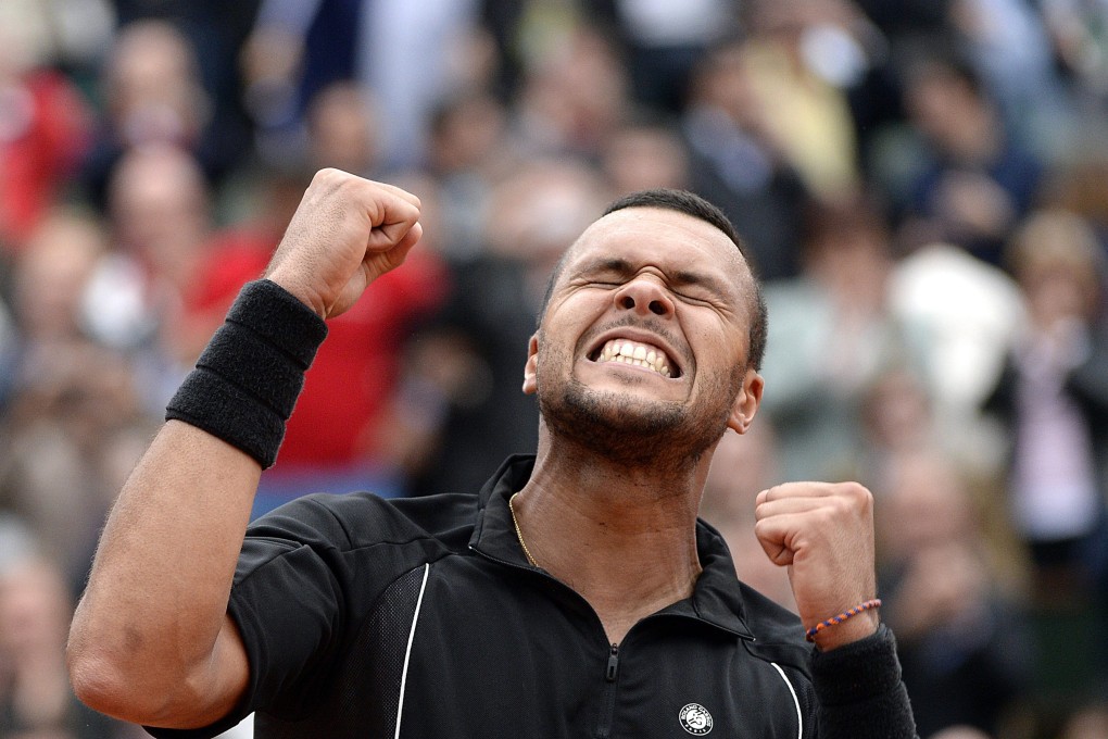 Jo-Wilfried Tsonga celebrates after winning against Tomas Berdych. Photo: EPA