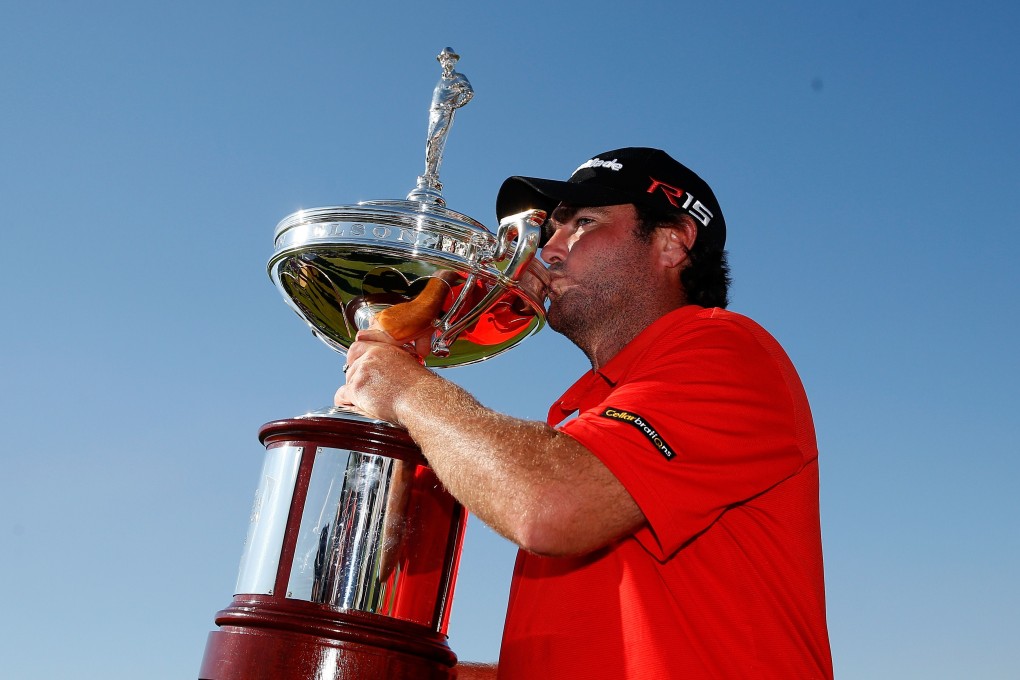 Steven Bowditch kisses the trophy. Photo: AFP