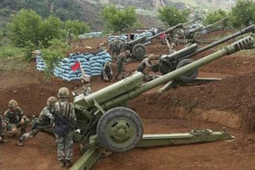 Regular and reserve troops from the army and air force take part in the live-fire drill near the border. Photo: SCMP Pictures