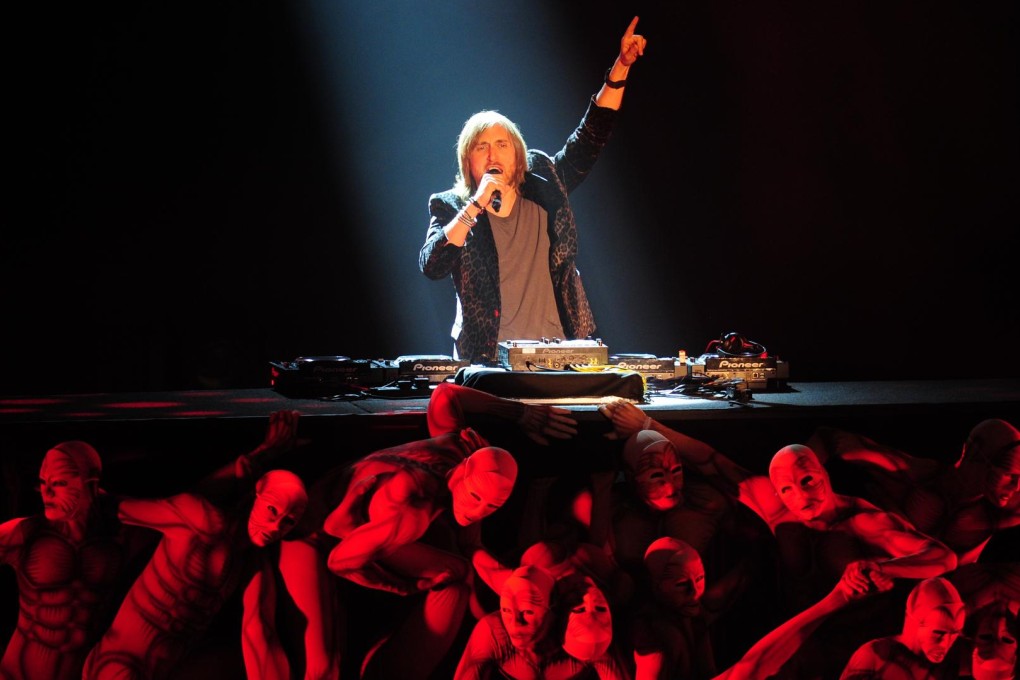 Point man: Guetta takes to the mic at the MTV European Music Awards in Belfast, Northern Ireland in 2011. Photos: AFP, Corbis
