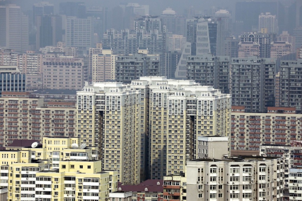 Residential properties tower in Beijing as Moody's upgraded China's property market to stable from negative. Photo: Reuters