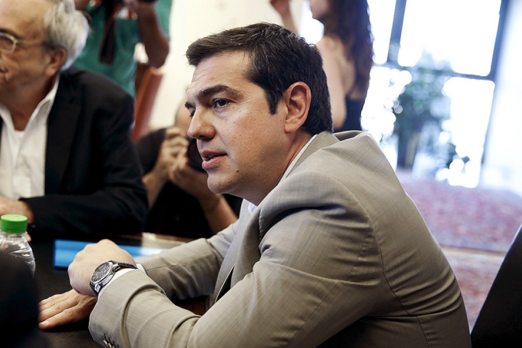 Greek Prime Minister Alexis Tsipras looks on during a meeting at the Ministry of Culture, Education and Religious Affairs in Athens. Photo: Reuters